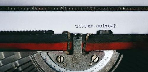 Typewriter writes "stories matter"